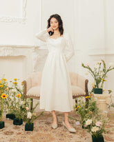 Silk midi dress with sweetheart neckline and long sleeves for romantic and refined elegance